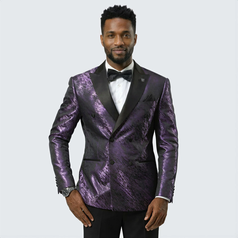 Men's formal purple jacquard tuxedo jacket. Features black satin peak lapel, double-breasted front, two pockets, and structured shoulders. Vivid purple color with a textured pattern.
