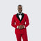 Red double-breasted suit with black velvet lapel and matching trousers. Includes a black bow tie. Classic and stylish.
