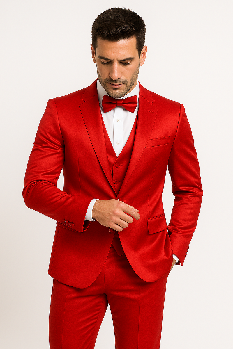 Red Majesty tuxedo set: tailored red satin jacket (notched lapel, 2 buttons), matching vest (pointed hem), and pants. Includes bow tie. Cohesive red formal ensemble.