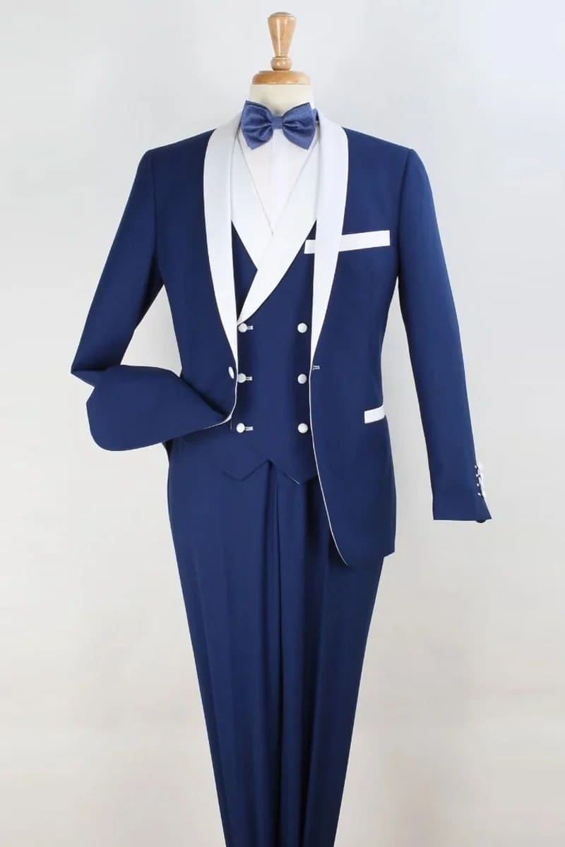 Royal blue tuxedo with white shawl collar & trim, double-breasted vest (5 buttons, white pocket accents) & matching trousers.