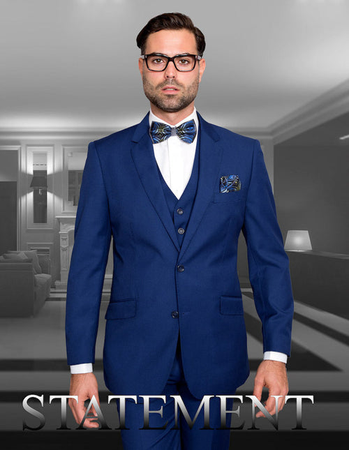 Men's Sapphire Blue wool suit with a modern fit. Includes a 2-button jacket, vest, and notch lapels. Features a solid color, two front pockets, and is crafted from wool.