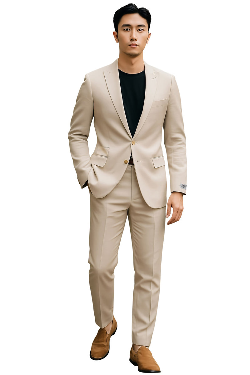 Tan Stacy Adams slim-fit suit for men. Tailored blazer with gold buttons, notch lapels, and two-button closure. Matching slim trousers with a straight leg. Smooth, light tan fabric. Ideal for weddings/business. Fitted silhouette.
