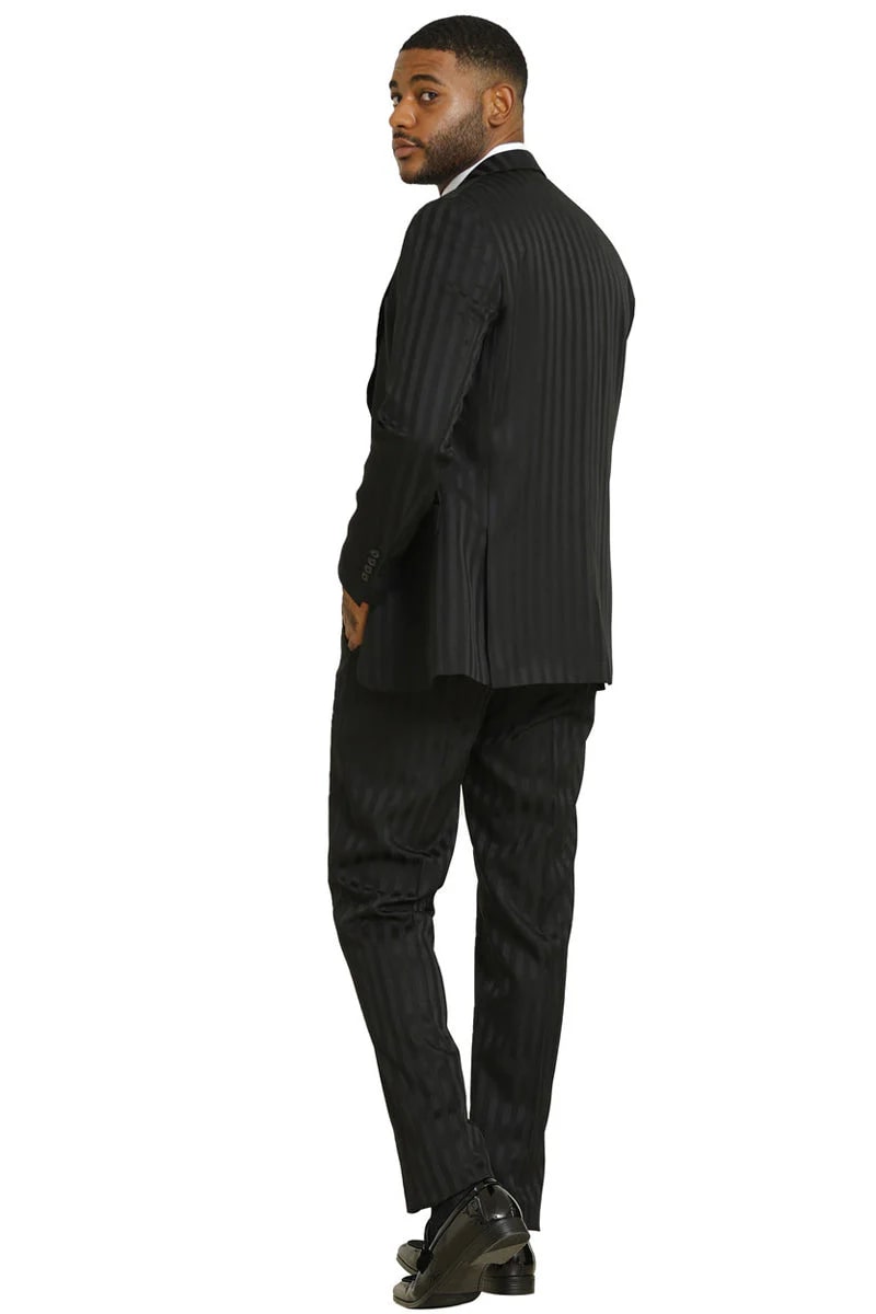 Stacy Adams modern fit black suit with shadow pinstripes. Features a vested design, tailored jacket & matching trousers. Sleek black color, smooth fabric, and vertical pinstripes for a structured, polished look. Fitted.
