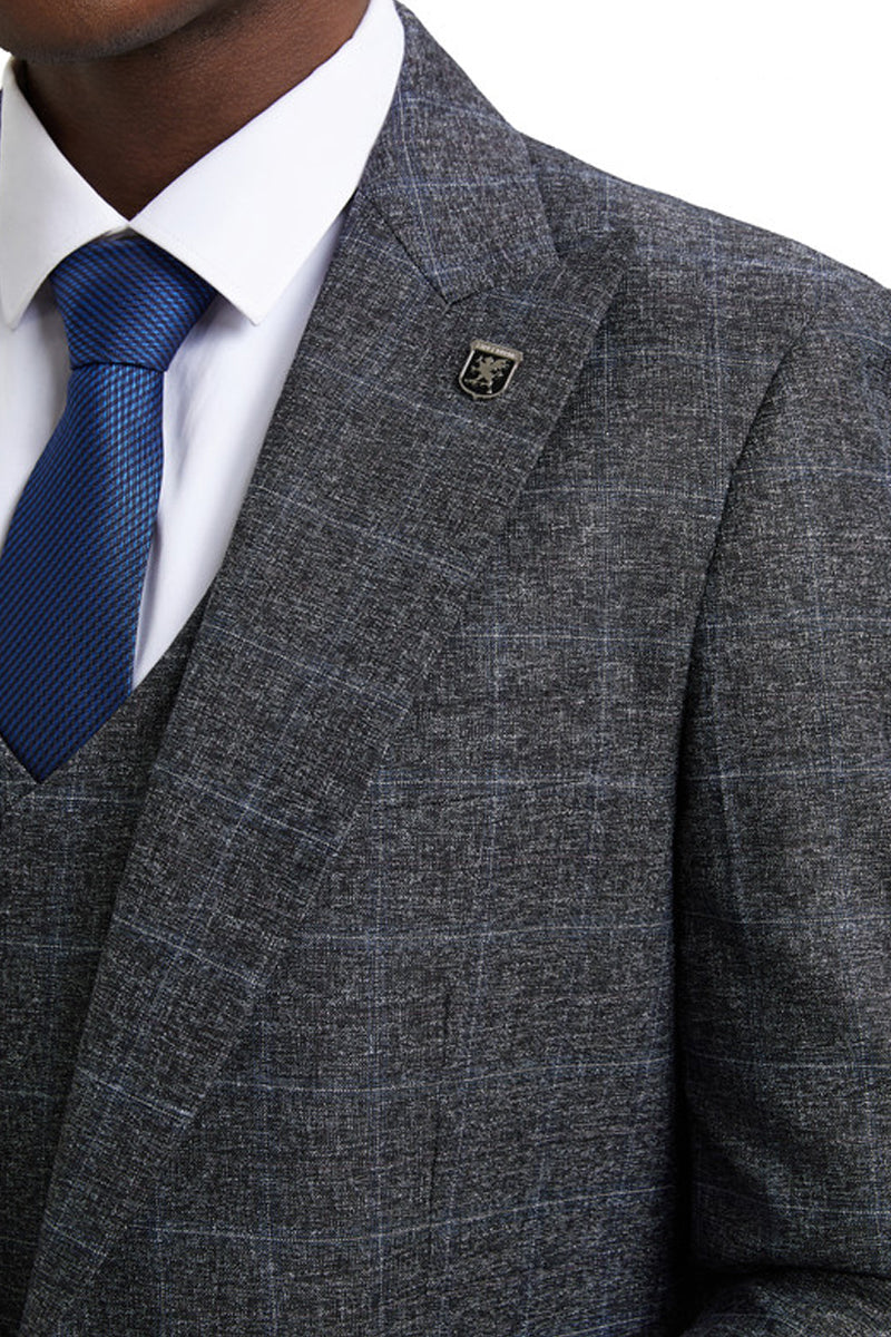Stacy Adams men's charcoal grey plaid suit: one-button, peak lapel, fitted. Features a textured, woven fabric. Includes matching vest, black crest pin, and blue patterned tie for a coordinated business look.
