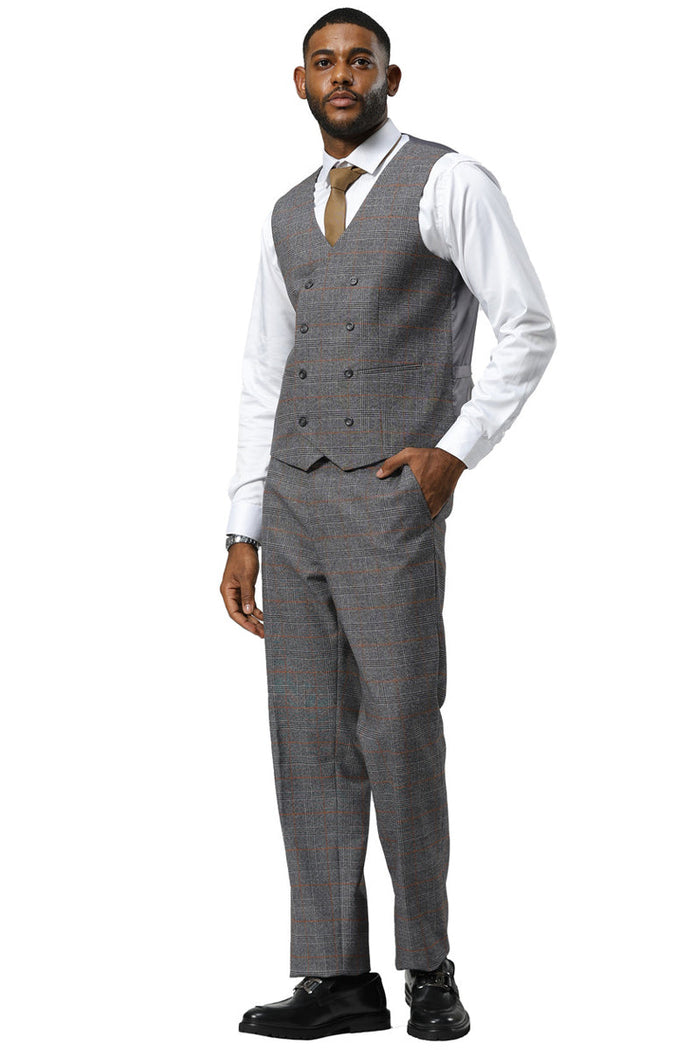 Men's Stacy Adams suit in grey glen plaid with peak lapels. Includes a double-breasted vest. Fitted jacket, tailored trousers, textured fabric. Classic style.
