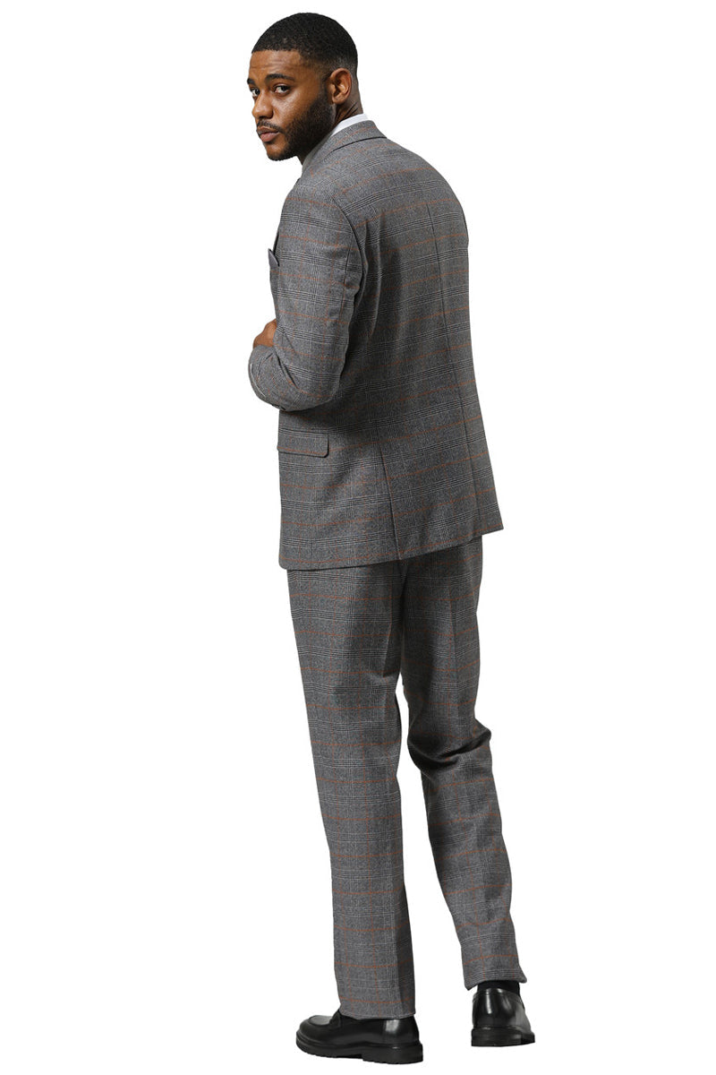 Men's Stacy Adams suit: Grey glen plaid, one-button jacket with peak lapel. Tailored fit, matching pants. Includes double-breasted vest. Structured fabric for a formal look.

