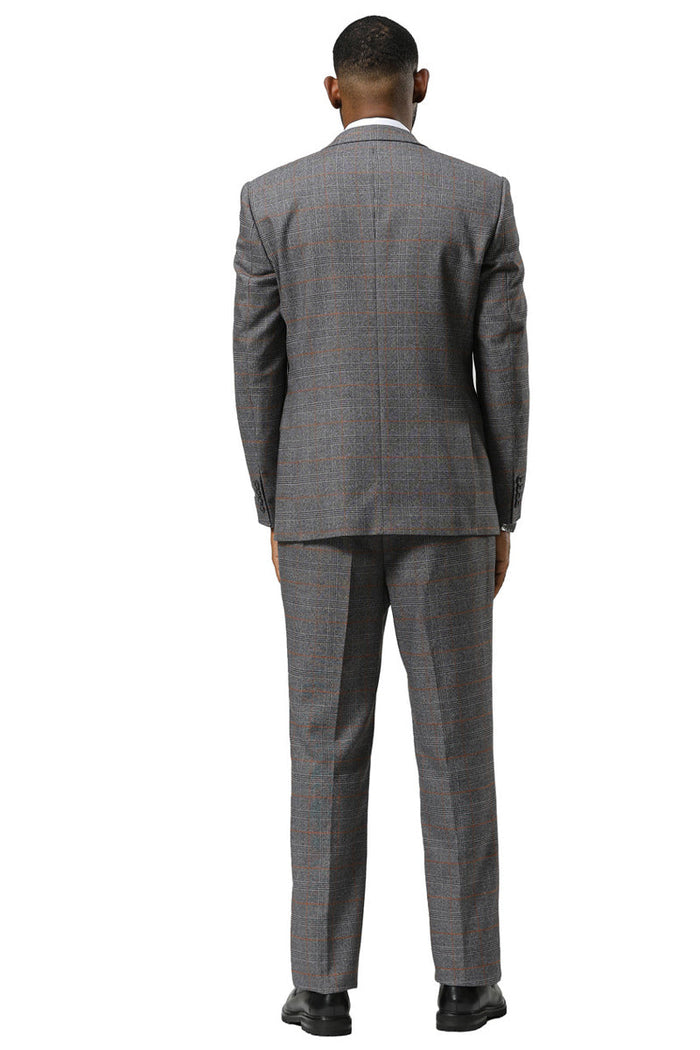 Men's Stacy Adams grey glen plaid suit with peak lapel. Structured fabric, single vent jacket, straight-fit trousers. Grey tones with subtle orange accents in the plaid.
