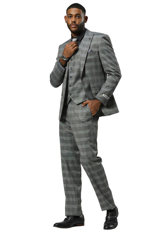Grey glen plaid Stacy Adams suit. One-button jacket with peak lapels, structured shoulders, and matching vest. Straight-cut trousers complete the fitted silhouette.
