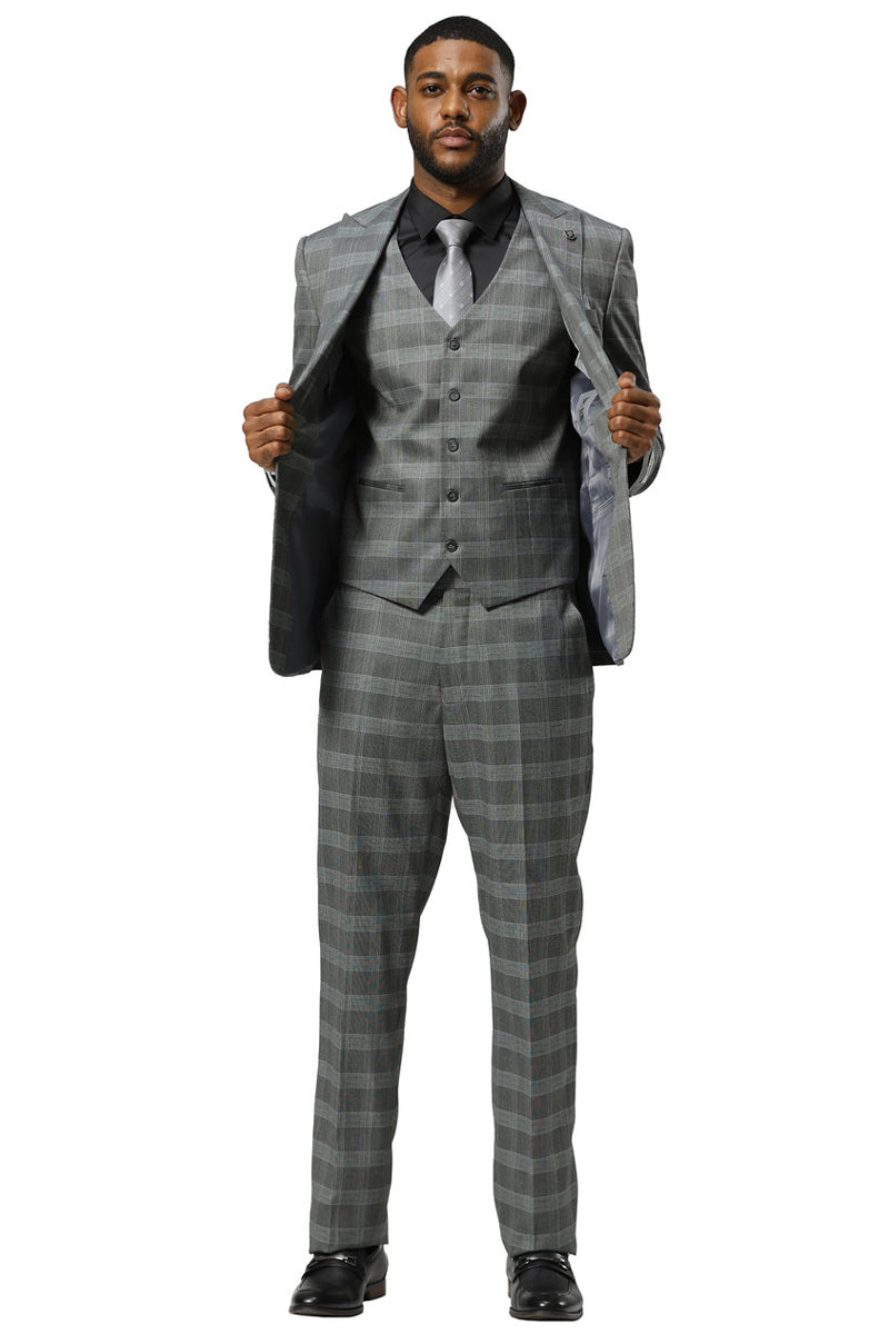 Stacy Adams men's grey glen plaid one-button vested suit with peak lapel. Features matching trousers and a vested jacket with a single button closure. Checkered design with light & dark grey squares & subtle blue accents. Lined interior.
