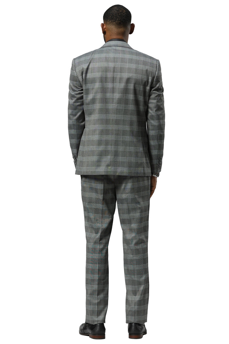 Stacy Adams men's grey glen plaid suit with a one-button front and peak lapels. Structured silhouette with textured plaid fabric. Includes a vested jacket and straight-leg trousers.
