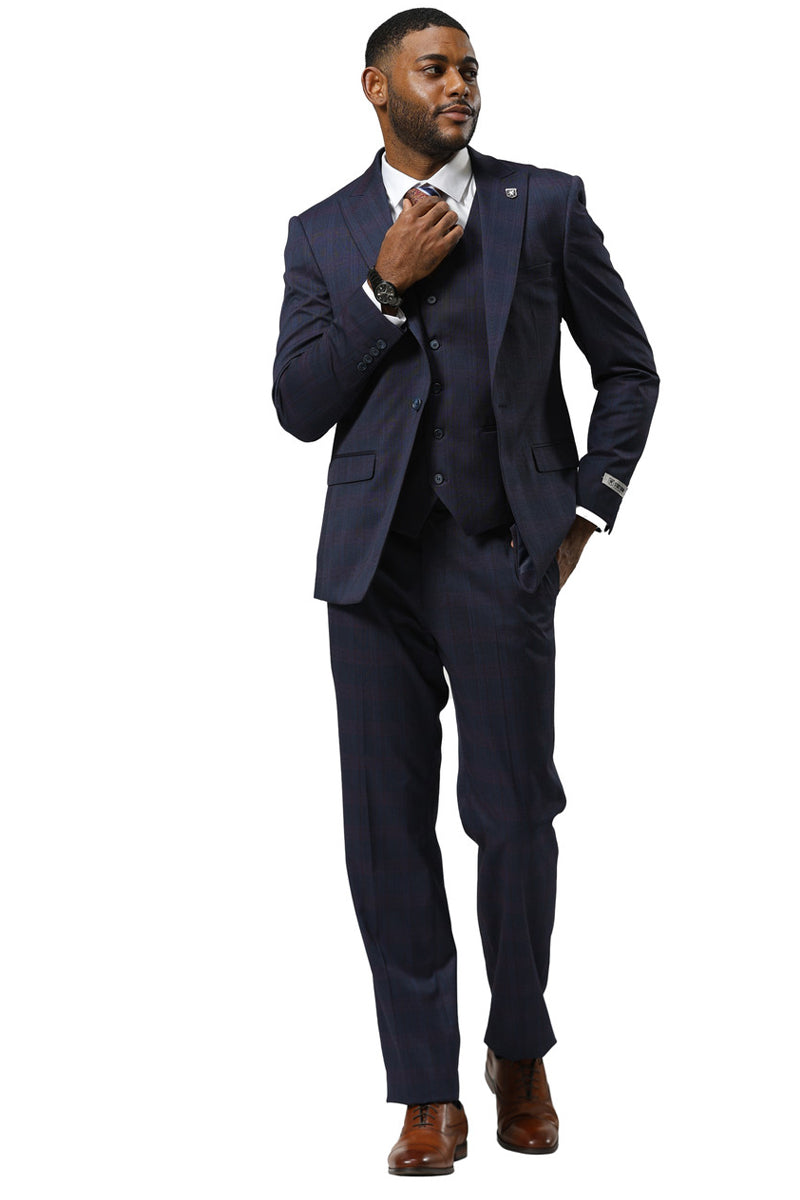 Navy glen plaid Stacy Adams suit. One-button closure, peak lapels, three-piece design (vest included). Wool-like fabric, subtle contrasting lines. Matching tapered trousers.
