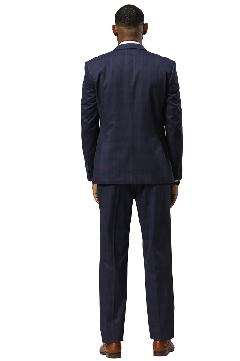 Navy glen plaid Stacy Adams suit with a fitted silhouette. Features a one-button peak lapel blazer, vested piece, and straight-cut trousers. Durable, textured fabric with subtle checks. Tailored look.
