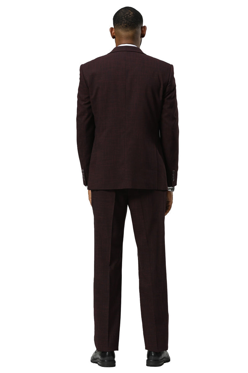 Burgundy Stacy Adams sharkskin suit: One-button peak lapel vest, slim-fit jacket. Subtle texture. Straight leg pants. Cohesive, formal look.
