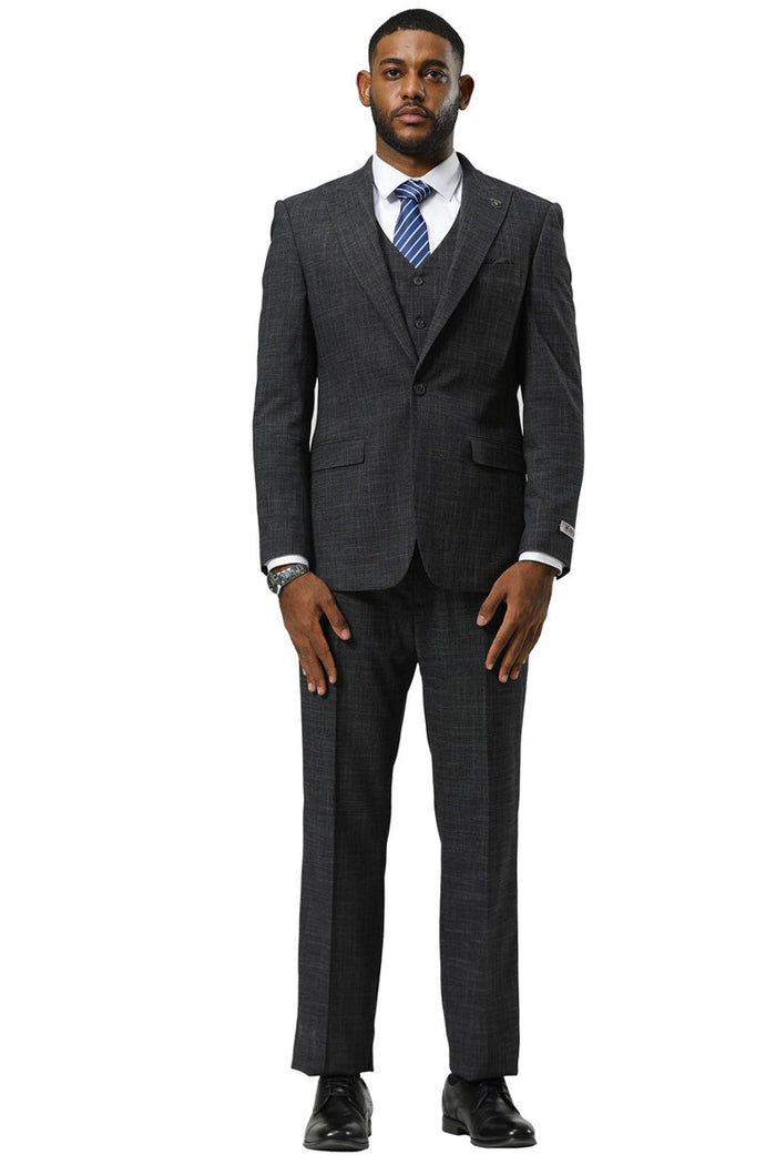 Stacy Adams charcoal sharkskin suit. One-button, peak lapel, vested. Tailored silhouette, straight-leg trousers, subtle patterned fabric. Notch lapels, side pockets.

