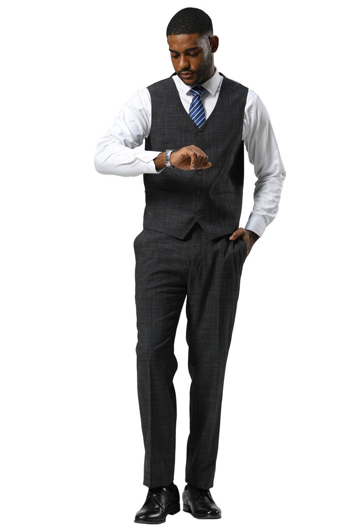 Men's charcoal sharkskin suit by Stacy Adams. One-button peak lapel, fitted design. Includes vest. Straight-leg pants.  Complete with white shirt & blue striped tie.
