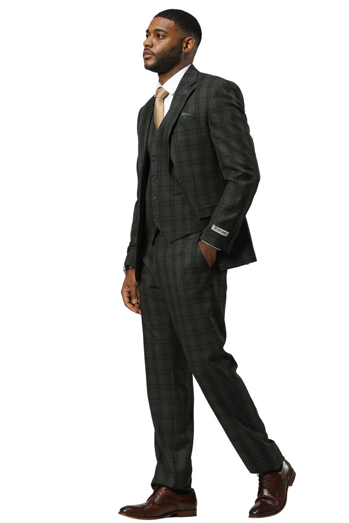 Hunter green modern fit Stacy Adams suit with double windowpane plaid. Single-breasted jacket, three-button vest, & trousers. Smooth, structured fabric for a tailored fit.
