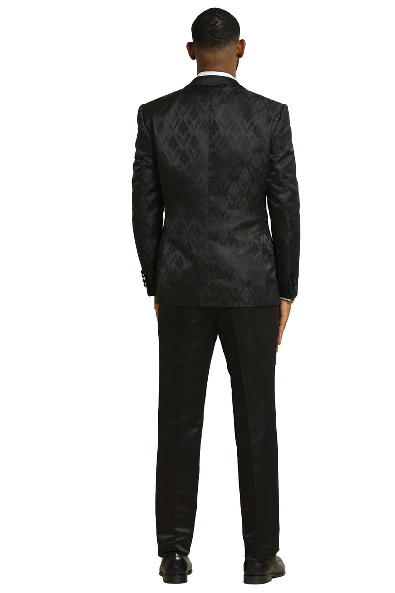 Stacy Adams men's shiny brocade tuxedo. Black, glossy fabric with a subtle diamond-like brocade pattern. Includes a double-breasted vest, tailored pants, and a formal silhouette. Perfect for weddings and proms.
