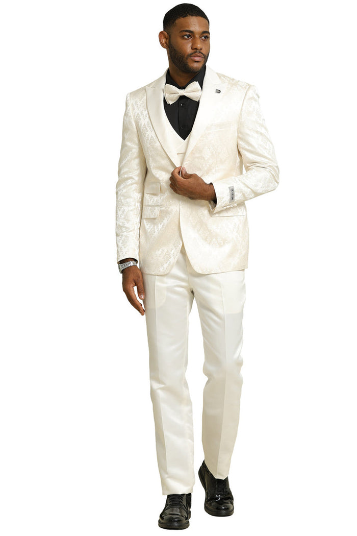 Ivory men's tuxedo with shiny brocade jacket, double-breasted, satin lapels. Includes matching pants, black vest & bow tie for a formal look.
