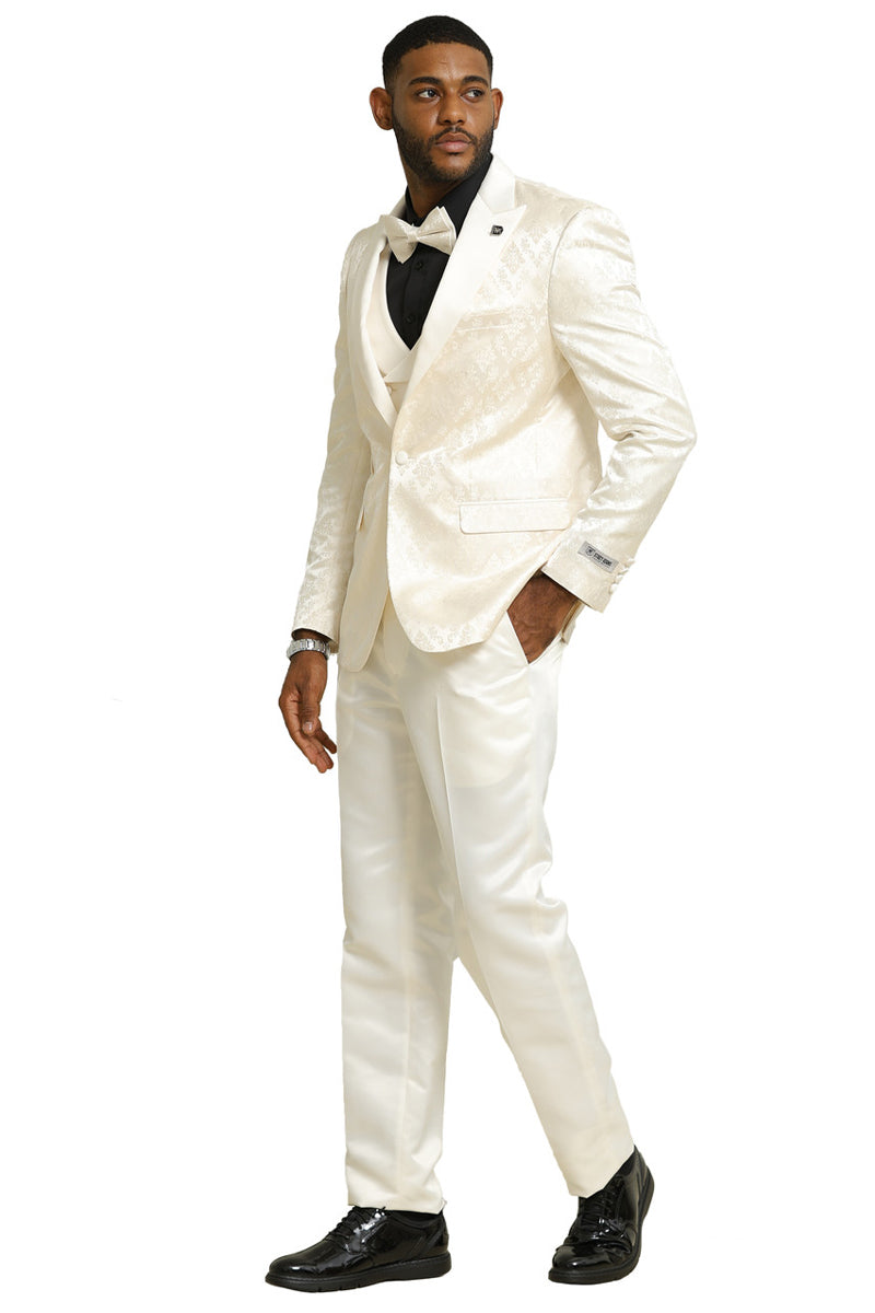 Ivory men's tuxedo with shiny brocade, double-breasted vest. Includes black shirt, bow tie. Slim fit tailcoat jacket, matching smooth trousers. Formal elegance.
