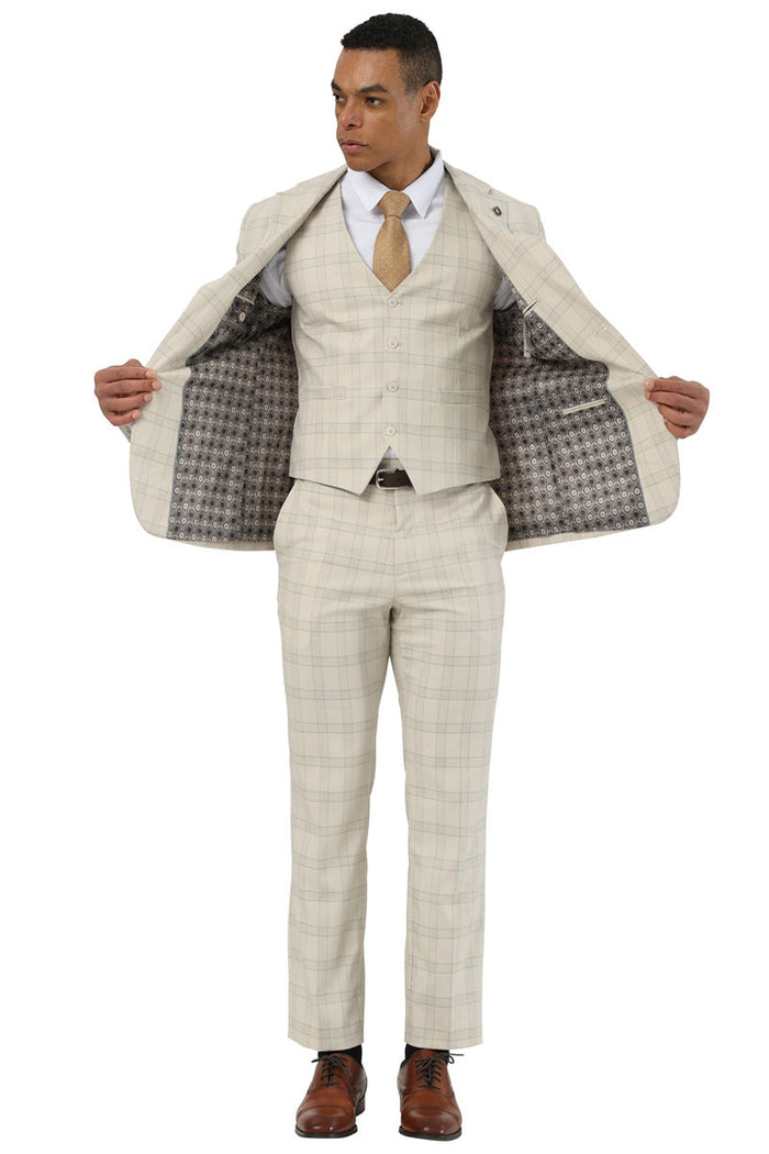 Stacy Adams men's beige glen plaid suit: single-breasted jacket with vested interior, tailored fit, contrasting lining. Straight-leg trousers match the jacket's material and pattern for a cohesive look.
