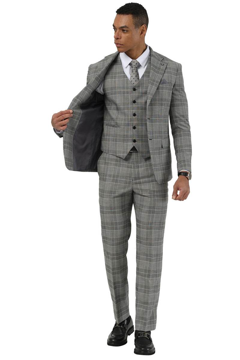Stacy Adams men's grey glen plaid vest suit. Three-piece design: vested jacket, form-fitted trousers. Wide notch lapel, two-button front, single vent. Grey suit with black, blue, and red glen plaid detailing. Jacket lined in black.
