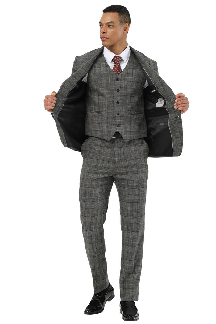 Stacy Adams men's black glen plaid suit with wide notch lapel, matching vest, and tapered trousers. Features a two-button closure and black lining. Fabric blend of synthetic and wool.
