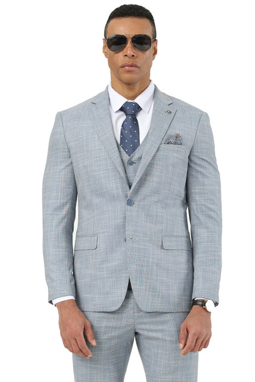 Stacy Adams men's suit: light grey sharkskin, subtle texture. Tailored jacket (notch lapels, single button) and matching trousers. Includes a blue polka dot tie and patterned pocket square for added detail.
