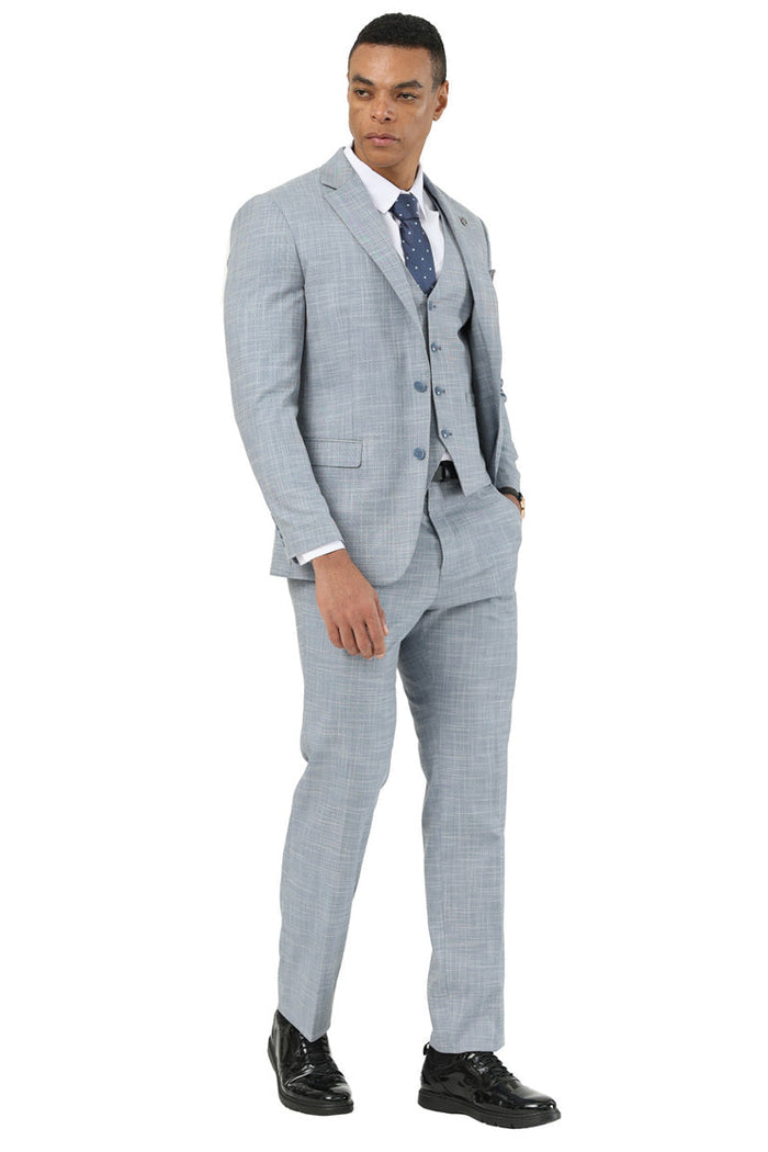 Stacy Adams men's light grey sharkskin vested suit. Tailored fit, single-breasted jacket, subtle check. Includes matching vest, straight-leg pants. Lightweight material, structured silhouette.

