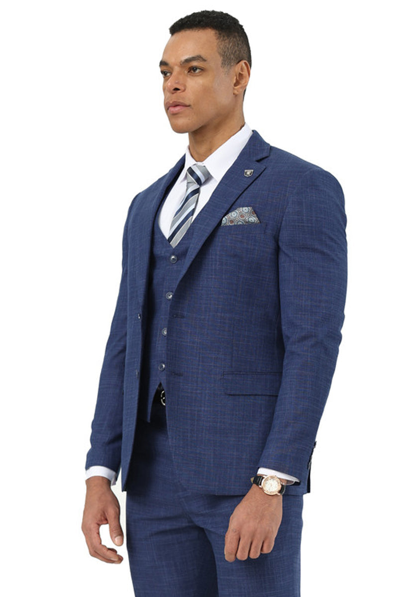 Stacy Adams men's suit: indigo blue, sharkskin weave. Single-breasted jacket, vest, & fitted pants. Smooth fabric with subtle sheen. Designer tailored look.
