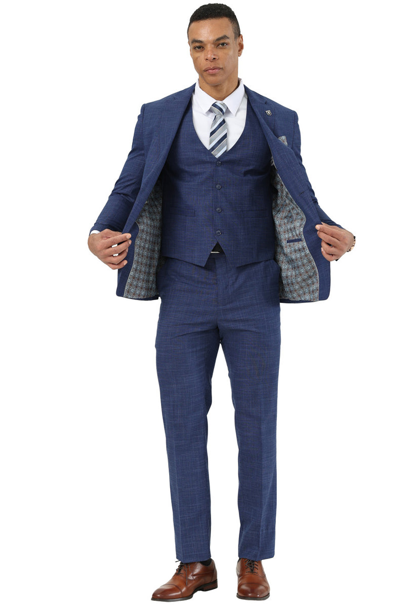 Indigo sharkskin suit by Stacy Adams. Structured blazer with 3-button closure, matching vest, and tailored straight-leg pants. Blazer has patterned lining.