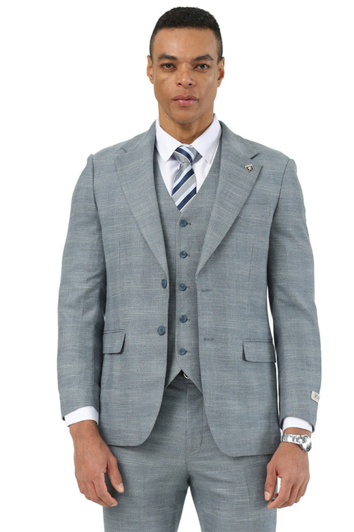 Men's Stacy Adams business suit in light grey sharkskin. Structured jacket with notch lapel, two buttons. Matching vest with five buttons. Tailored for a fitted look.
