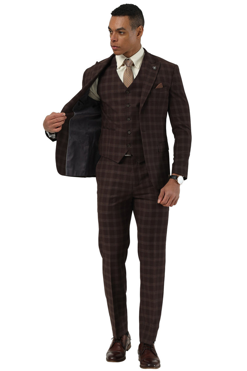 Men's Stacy Adams brown plaid suit: one-button peak lapel jacket, vest, and straight-cut pants. Tailored fit with sharp lines. Features a brown plaid pattern in a smooth fabric. Jacket has contrasting lining.
