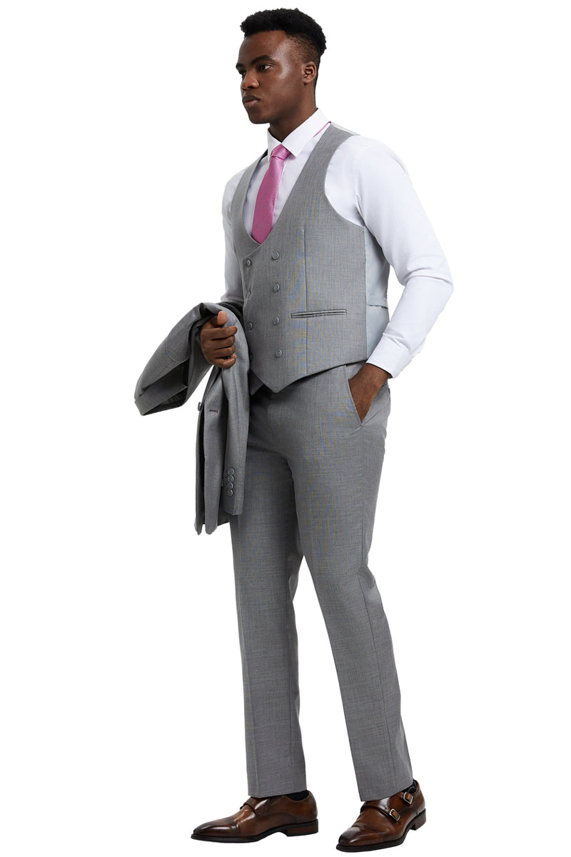 Light grey Stacy Adams men's sharkskin suit. Two-button jacket, fitted double-breasted vest with pockets. Straight-leg trousers. Subtle textured fabric.
