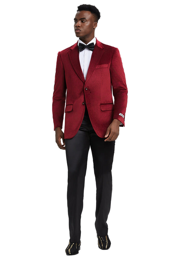 Burgundy men's Stacy Adams velvet blazer. Modern fit, tailored silhouette, and soft velvet fabric. Features a two-button closure, notched lapels, chest pocket, and decorative sleeve buttons.
