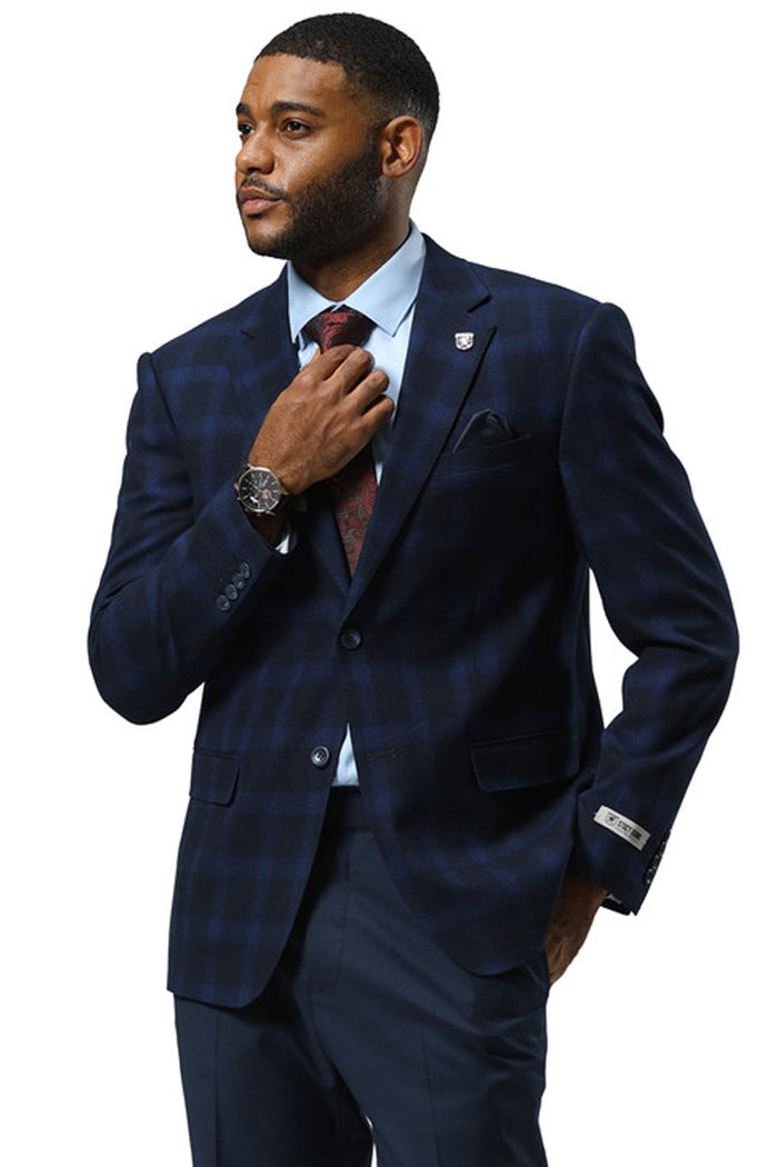 Dark navy plaid Stacy Adams blazer. Modern fit, single-breasted with notched lapels. Suitable for formal wear. Features two front pockets and a pocket square.
