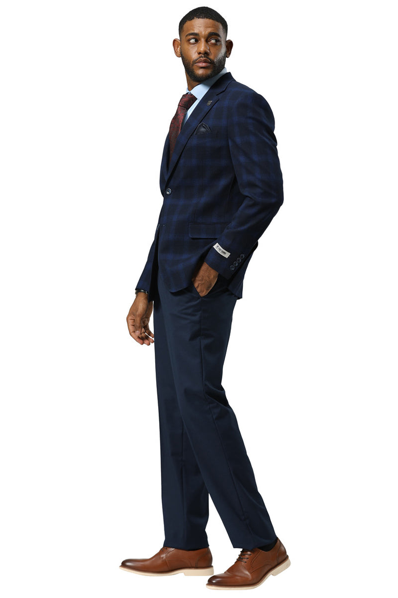 Stacy Adams men's navy blue modern fit sport coat. Tailored blazer with plaid pattern, two pockets, and notched lapel. Structured material for a formal look, with varying navy and blue tones.
