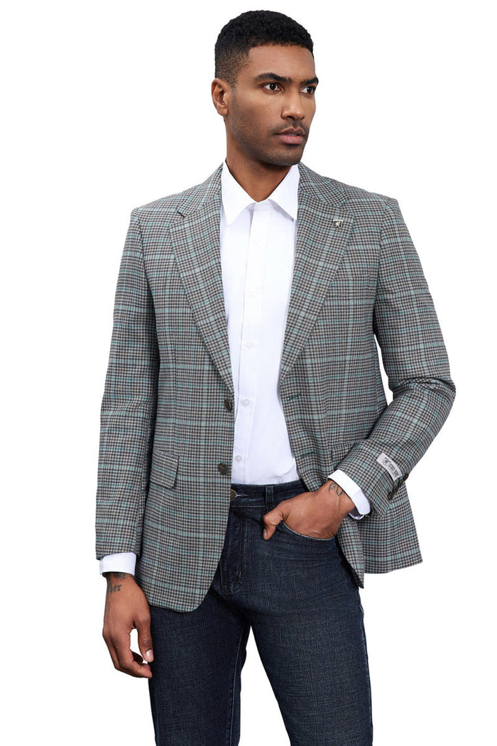 Stacy Adams modern fit blazer. Grey plaid pattern, structured fit, notched lapels, two front pockets, single-button closure. Lightweight, breathable woven fabric. Shades of grey with subtle color accents.
