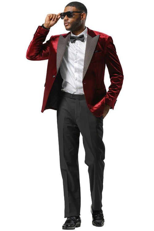 Burgundy velvet tuxedo jacket. Rhinestone lapel, fitted silhouette, single button closure, and two pockets. Luxurious texture with visible inner lining.
