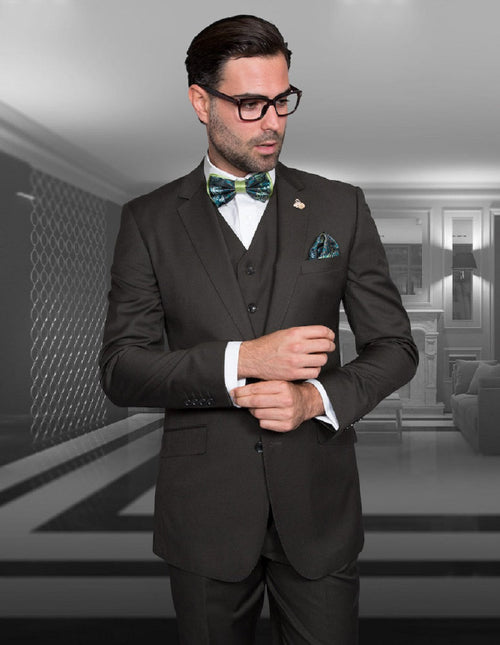 Men's olive wool suit with a modern fit. Two-button jacket, vested interior, notch lapels, and two front pockets. Slim fit design. Includes matching vest and trousers.
