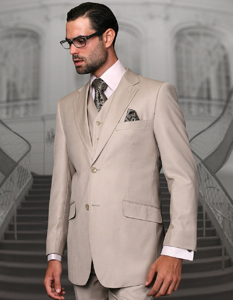 Men's modern fit, sand-colored wool suit. Two-button closure, three-piece (vest included), notch lapel, and side pockets. Clean silhouette and structured design.
