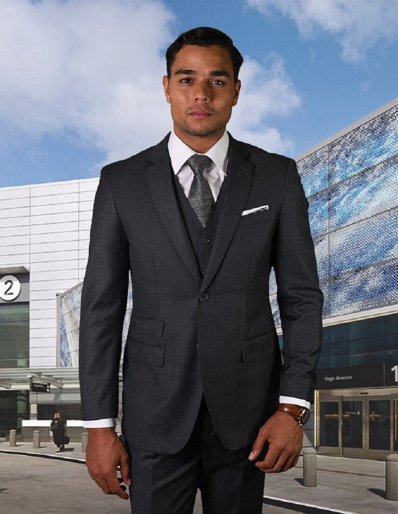 Charcoal grey men's modern fit suit. Includes jacket and vest with pick stitch detail. Jacket: notched lapel, 2-button closure, dual pockets. Vest matches. Uniform look.
