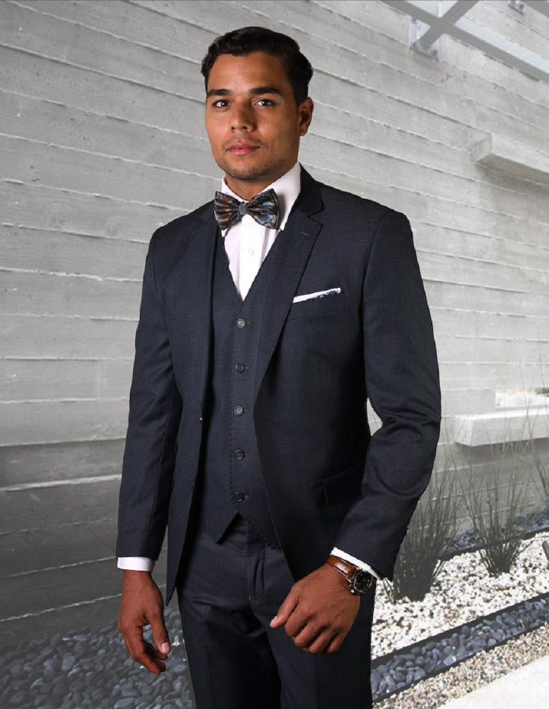 Men's modern fit suit in heather charcoal with 2-button closure, matching vest, and pick stitching. Features long sleeves with buttons and pocket square. Tailored fit for a textured appearance.