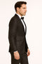 Men's black glitter tuxedo: satin shawl lapel, fitted, single-breasted. Glittery fabric with vertical stripes. Jacket: 2 pockets, 3-button cuffs. Matching trousers.
