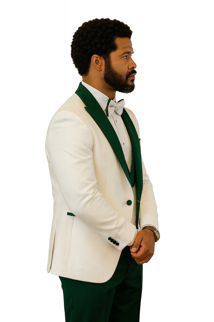 White paisley tuxedo jacket with hunter green shawl collar & matching buttons. Includes matching vest, hunter green wool pants, & white bow tie.
