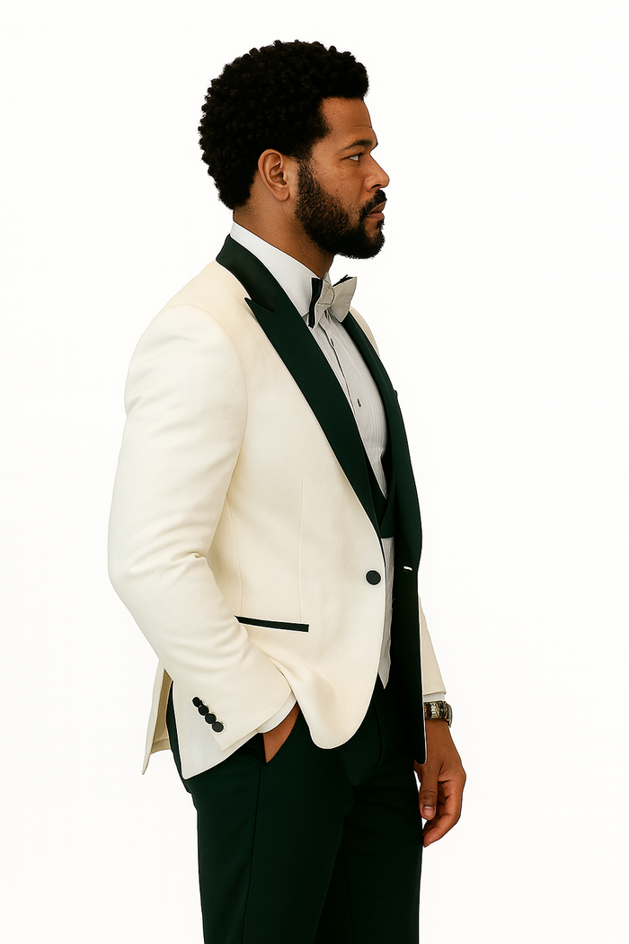 White peak lapel tuxedo jacket with black trim. Includes black shawl vest, wool pants, and a bow tie. Classic formal wear ensemble.
