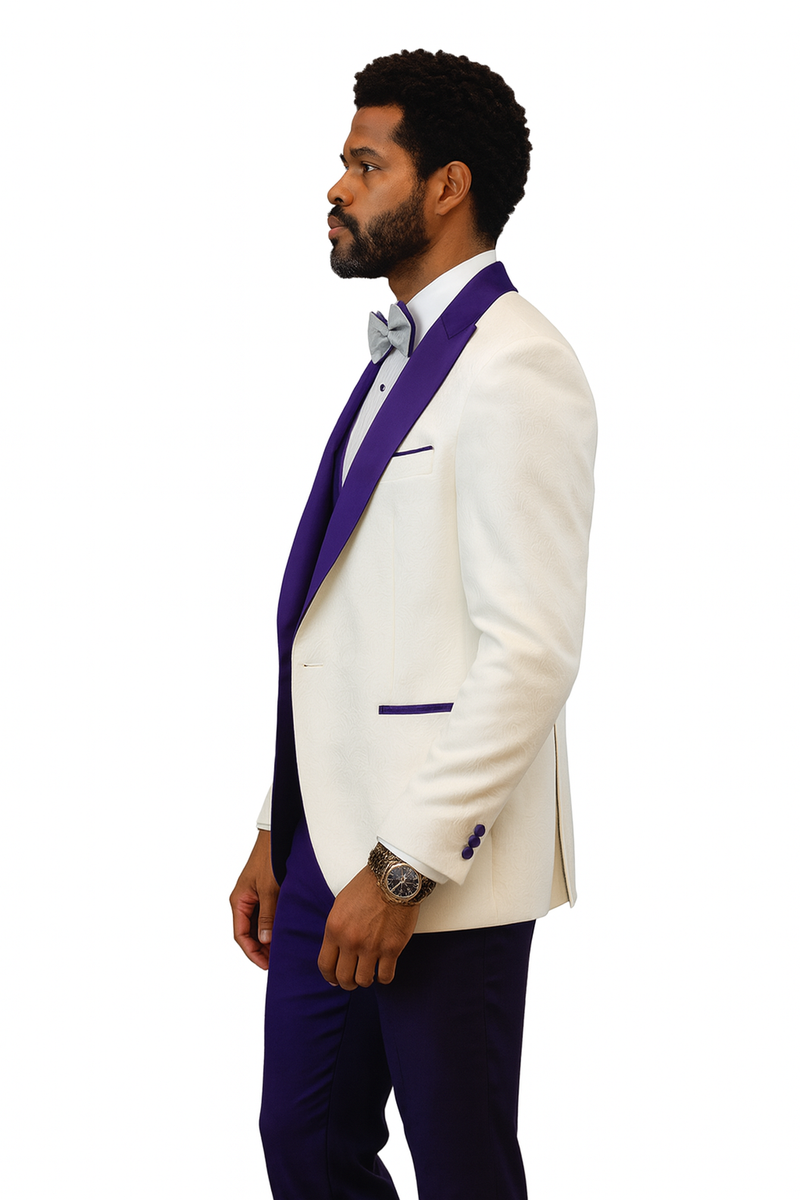 Hilton tuxedo: white & purple paisley peak lapel jacket, matching shawl vest & purple wool pants. Bow tie & contrasting pocket details complete the look.
