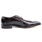 Belvedere Siena black ostrich leg moc toe dress shoe. Smooth, polished finish with ostrich skin texture. Rounded toe, sleek silhouette, and moc toe stitching. Dark, flat sole.
