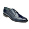 Navy ostrich leg moc toe dress shoe by Belvedere. Smooth, tapered design with a rounded toe and polished finish. Textured pattern, metal lace accent, and flat sole with a heel lift.
