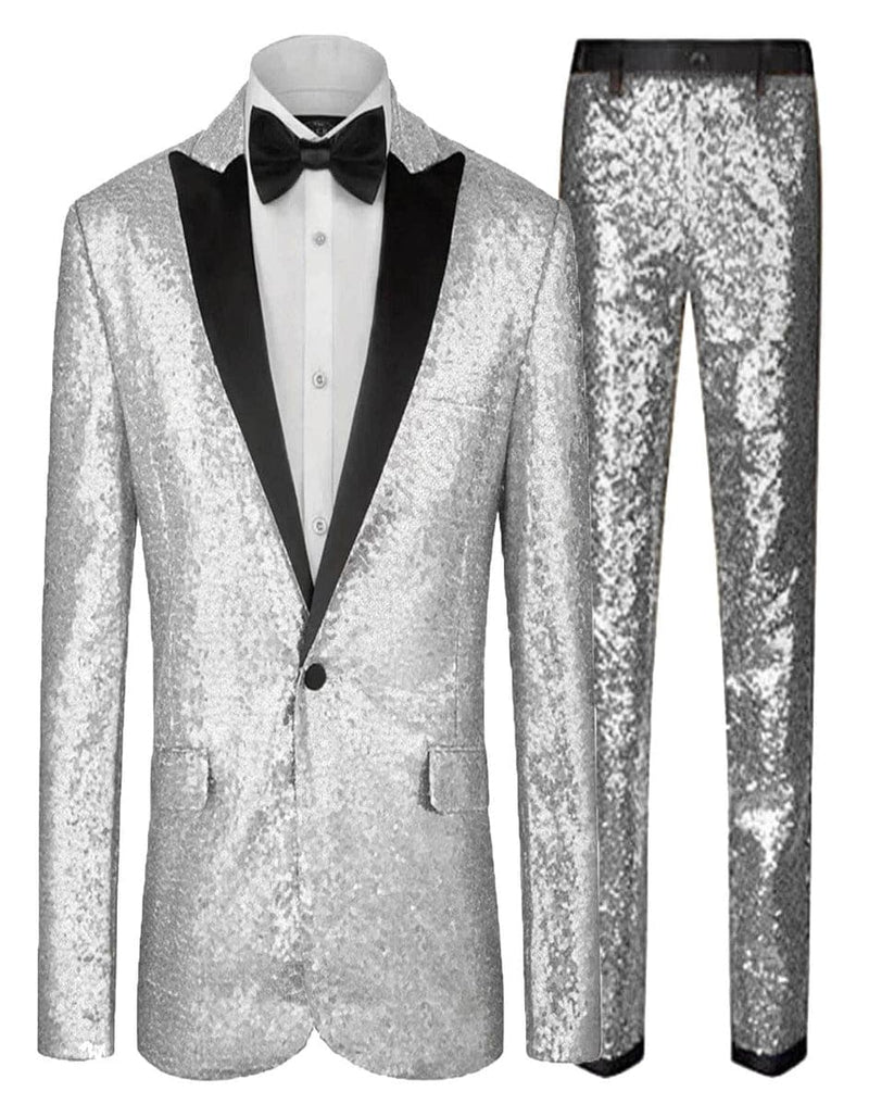 Silver-grey sequin suit with a shimmering effect. Includes fitted jacket, black shawl collar, and matching sequin pants. Shiny, glittering fabric.

