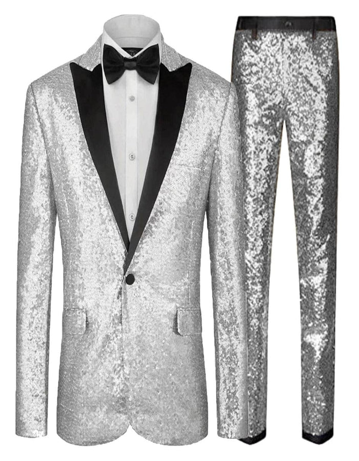 Silver-grey sequin suit with a shimmering effect. Includes fitted jacket, black shawl collar, and matching sequin pants. Shiny, glittering fabric.
